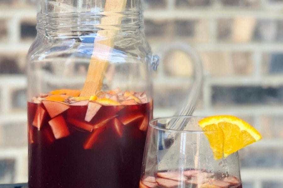 red wine summer sangria in glass pitcher
