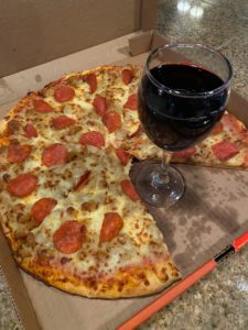 Meat Lovers Pizza and Red Wine