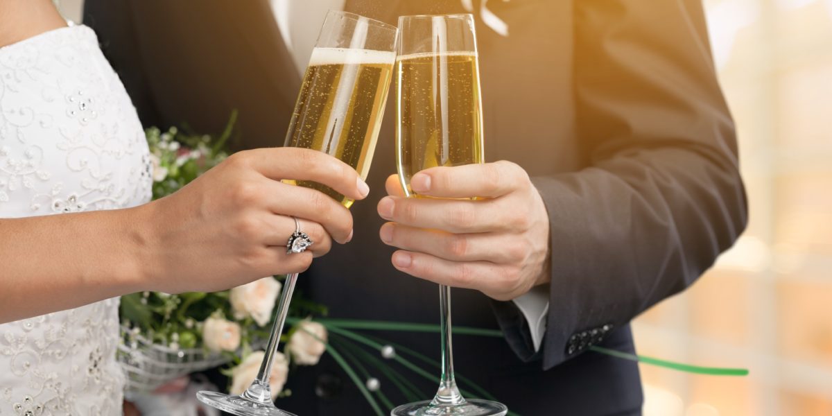 Toasting with sparkling wine at wedding