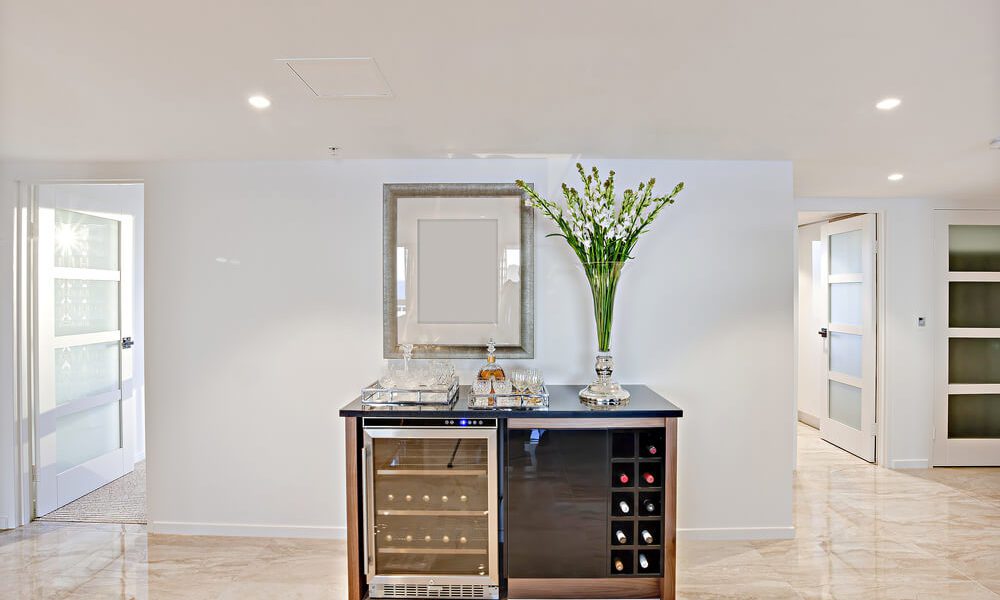 Wine storage cabinet with wine cooler in home