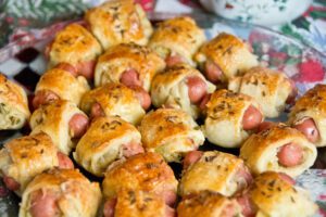 mini pigs in a blanket - football snacks with wine